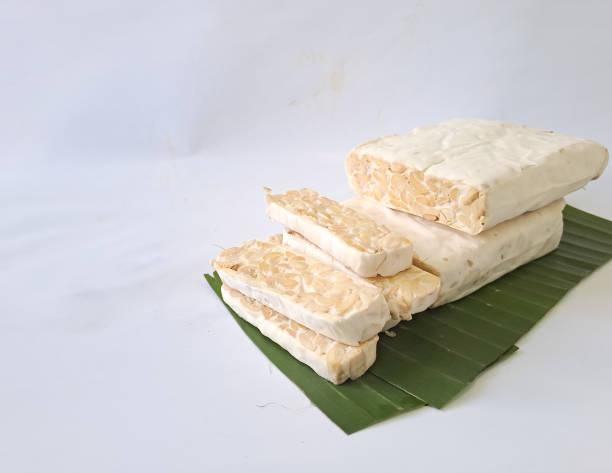 istock fresh tempeh isolated on white background, indonesian food 1474441470