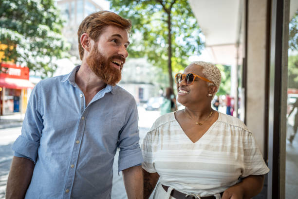 istock Mature couple walking while talk outdoors 1474445385