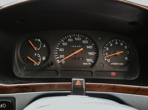 Old car speedometer dashboard instrument