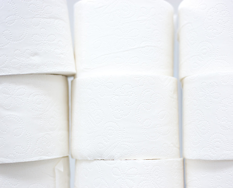 Stacks of White Toilet Paper