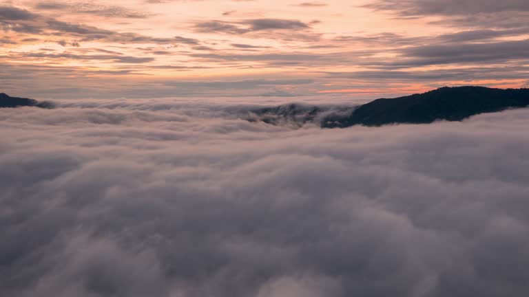 Beautiful morning scenery with mist golden light sunrise on high mountain.