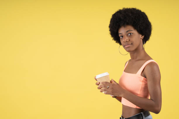 Beautiful afro woman with a cup of coffee