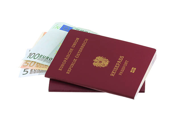 Electronic Austrian passports with 5, 50, 100 Euro Banknotes stock photo