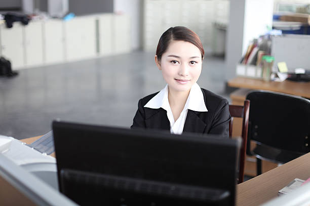 istock business woman with computer 147446805