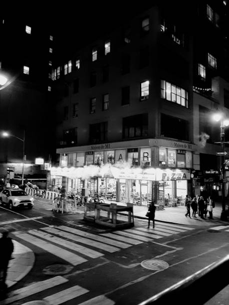 View of New York City at night, pizza place opened late.