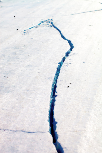 Crack in the ice road in the Arctic Tundra in Yellowknife Northwest territories