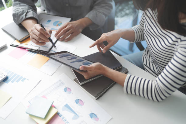 istock business startup team briefing plan project. creative startup business people group in office 1474473827