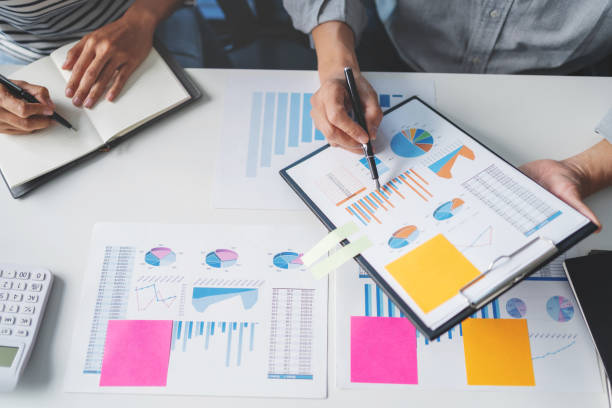 istock business startup team briefing plan project. creative startup business people group in office 1474473832