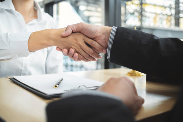 istock Teamwork colleagues business people handshake after meeting. 1474473857