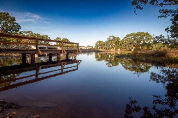 Early morning reflections in the lake at the Dunkeld Arboretum in Victoria’s west at the Grampians