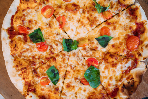 Neapolitan Pizza with buffalo mozzarella and basil