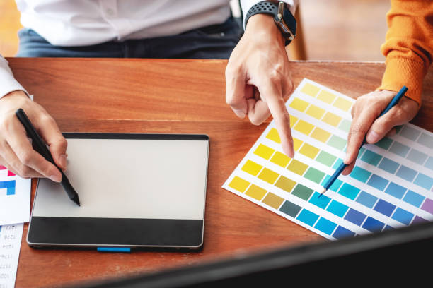 istock Graphic designer work with Color swatch samples Graphic Skill Concept. drawing sketches on graphic tablet 1474477075