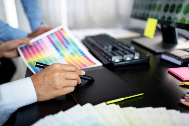 istock Graphic designer work with Color swatch samples Graphic Skill Concept. drawing sketches on graphic tablet 1474480616