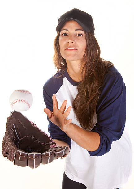 istock Woman Baseball or Softball Player Catching a Ball 147448408