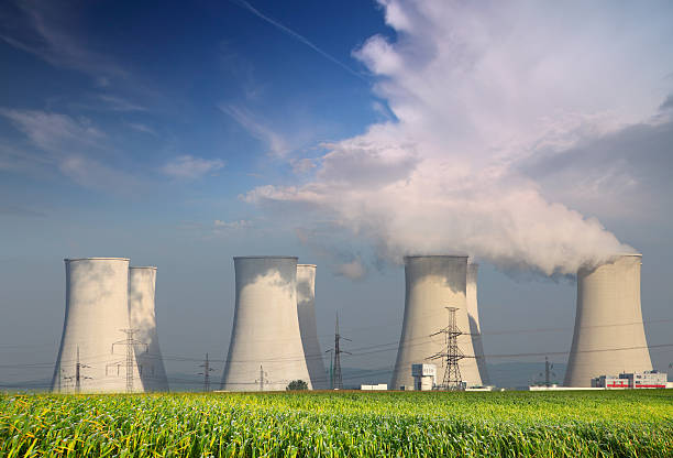 istock Nuclear Power plant with  field and blue sky 147448442
