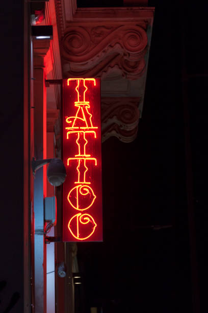 istock Red tattoo neon light sign 1474493925