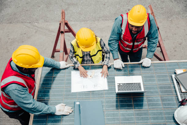 istock Group of professional engineer people meeting. 1474494873