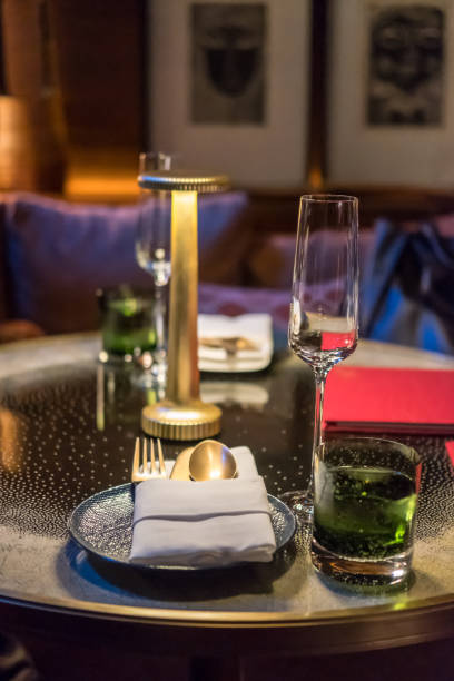 istock Champagne glass with plate and napkin on the table 1474494933