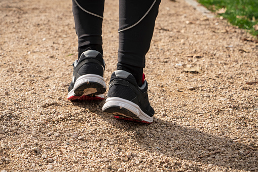 Men running feet with sport shoes.