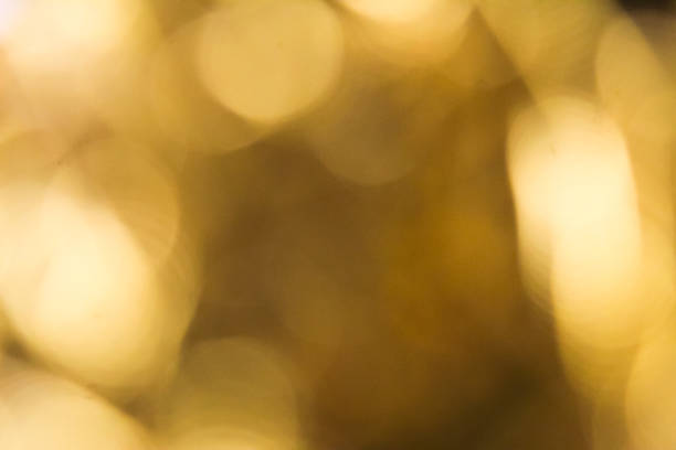 defocused abstract background of golden colored light