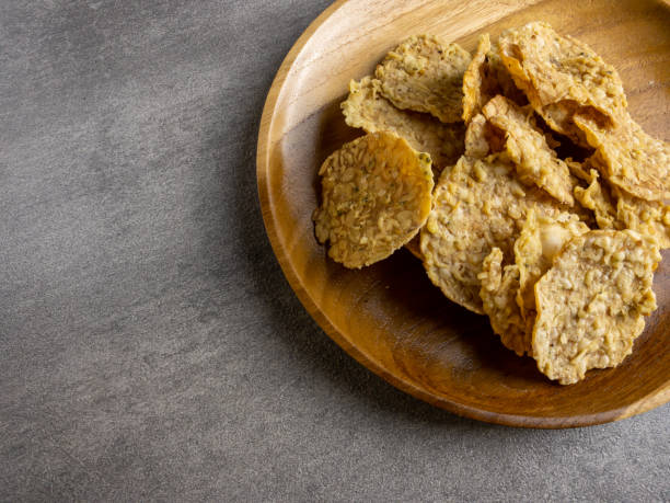 istock Keripik tempe or fried tempeh chips made from deep fried soy and battered flour. Popular snacks 1474497307