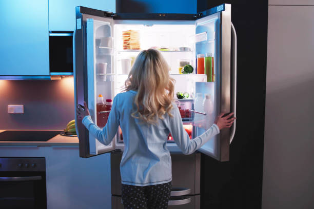 istock Hungry Woman At Night 1474498415