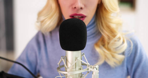 istock Young Woman Recording ASMR Sounds 1474498530