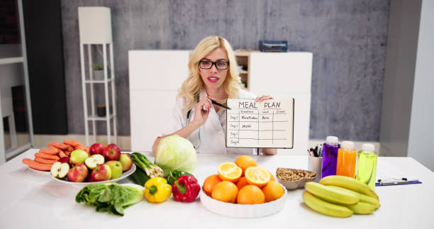 istock Dietician Nurse Writing Nutrition Goals 1474498532