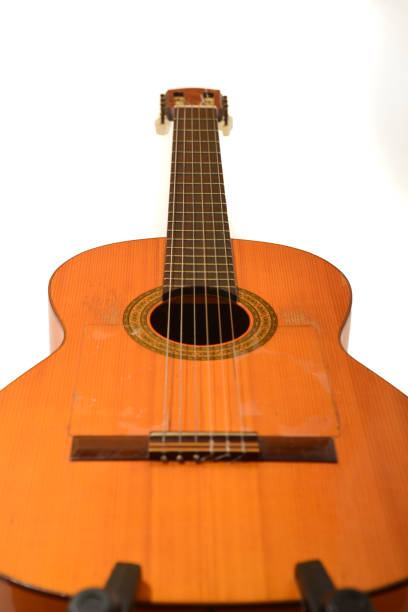 Acoustic guitar on white isolated background