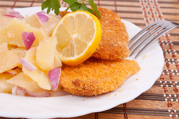 istock Hake fillets with potato salad 147450377