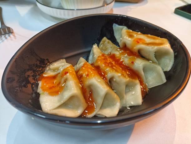istock gyoza in black bowl 1474504833
