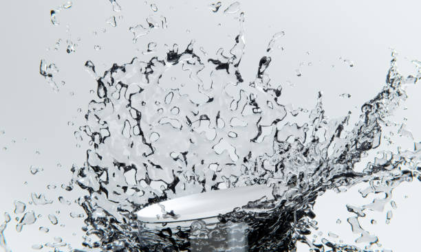 white podium and water splashingt on white background.