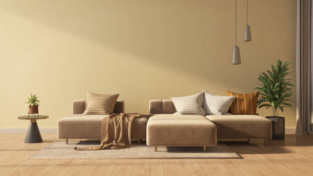 istock Brown sofa and yellow wall in modern living room.3d rendering 1474510500