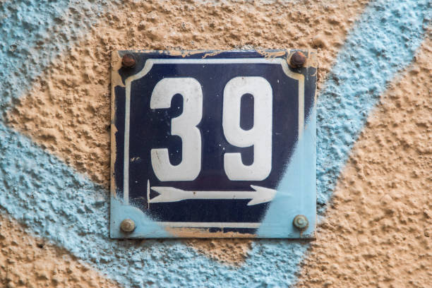 istock Weathered enameled plate number 39 1474510707