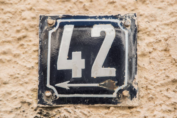 istock Weathered enameled plate number 42 1474510727