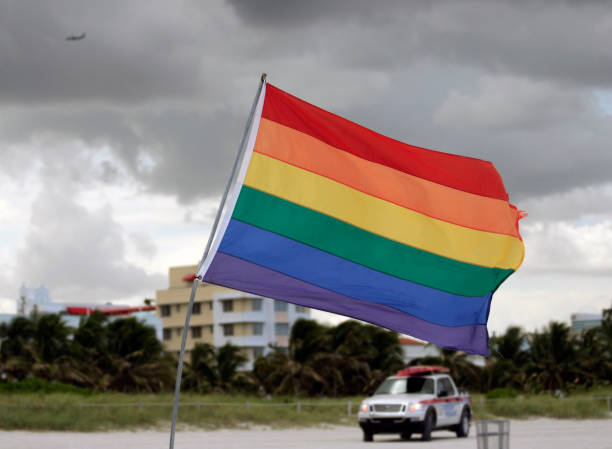 istock Rainbow Pride Flag waving at South Beach ,Miami 1474517805