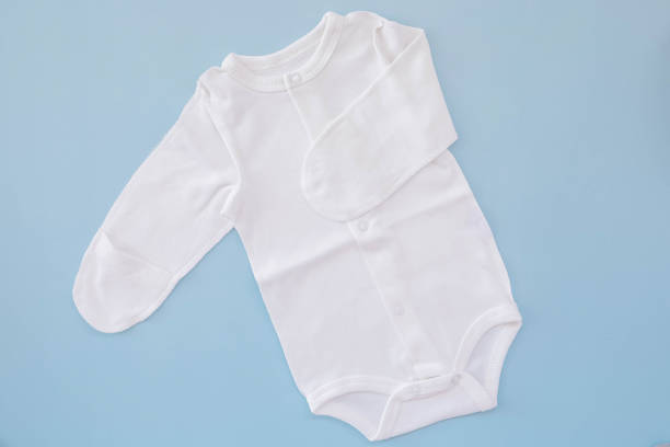 istock Mockup flat lay white bodysuit for on a blue background 1474521180