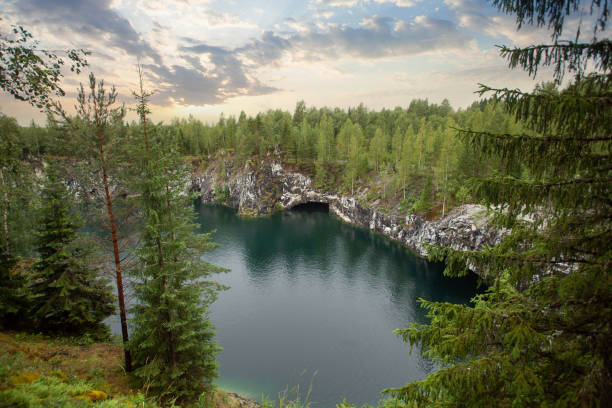 istock Spectacular cloudy sky, green trees and  mountain river 1474522223