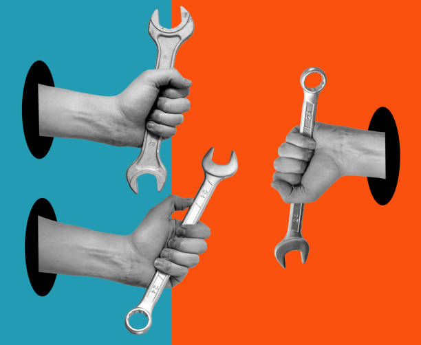 istock Art collage of hands with tools on a surreal background. 1474529612