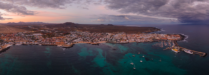 Spectacular high level panoramic aerial view of the early morning sunshine on Corralejo Fuerteventura Spain