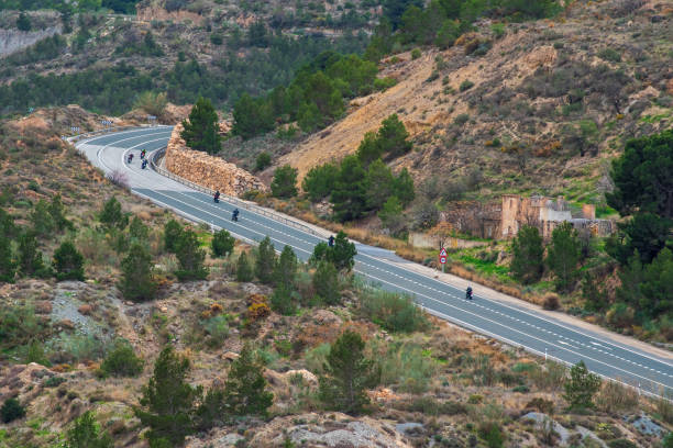 istock Several motorcycles circulating on a two-way road and with a curve in the mountains, enjoying the pleasure of driving. 1474538857
