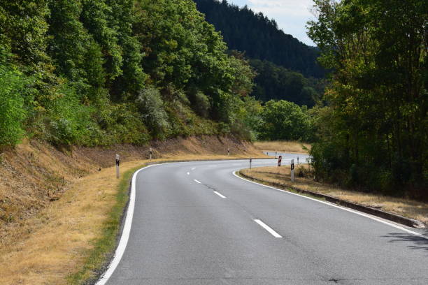 istock mountain road in summer 1474538898