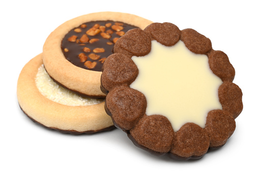 Different cookies on white background