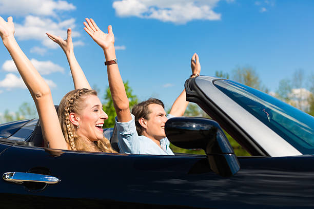 istock Young couple with cabriolet in summer on day trip 147454412