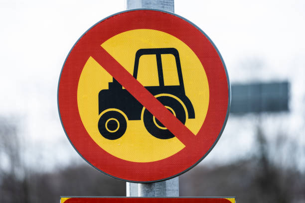 istock Tractors prohibited sign by a highway. 1474544380