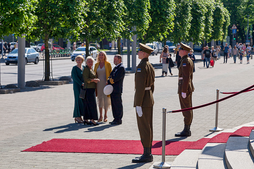 Tallinn, Estonia - June 15 2019: Soldiers at the entrance of the Estonia Theatre for an official visit of the Estonian President and the Danish Queen for the celebration of the 800 years since Dannebrog.