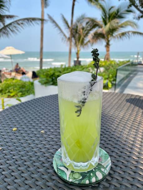 istock Guava juice mocktails with a beautiful sea view. 1474555192
