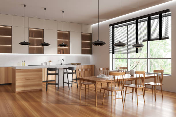 istock Light kitchen interior with bar countertop and eating area near panoramic window 1474557496