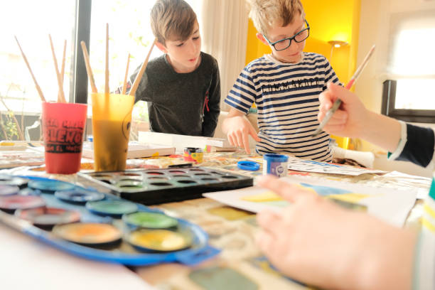 istock Children painting at home, making crafts. 1474559030