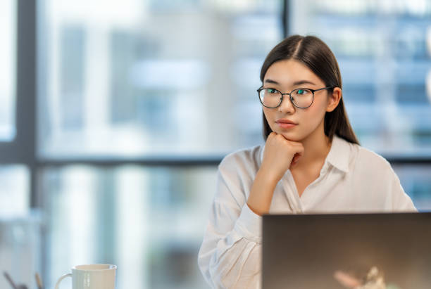 istock woman working in the office 1474565544
